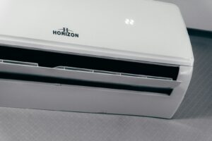 White air conditioner unit displaying 22 degrees